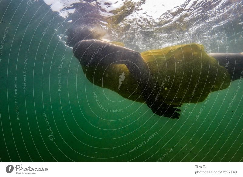 Girls swimming girl Swimming & Bathing Underwater photo Dive Water Woman Vacation & Travel Lake Playing lake green Dress Yellow Summer