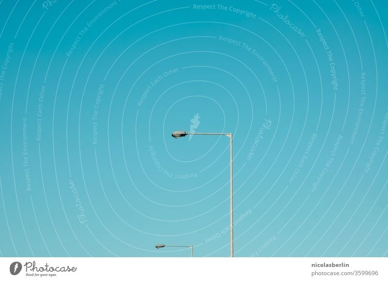 Street lighting and clear blue sky Lighting Road equipment Sky Blue Clear sky streetlamp street lamp urban Minimalistic minimalism gradient copy space