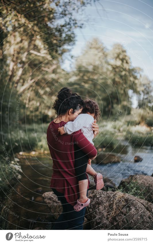 Mother holding daughter hug motherhood Mother's Day Mother with child Together togetherness Family & Relations Child Love Parents Infancy Woman Happiness Happy