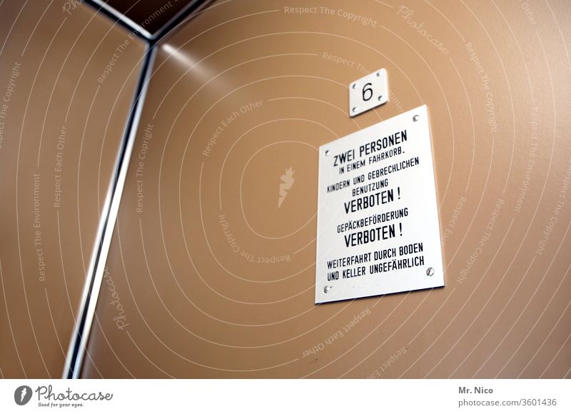 For children and infirm forbidden Elevator Car two persons Digits and numbers use up and down Paternoster elevator six Workplace Driving Safety Risk Change