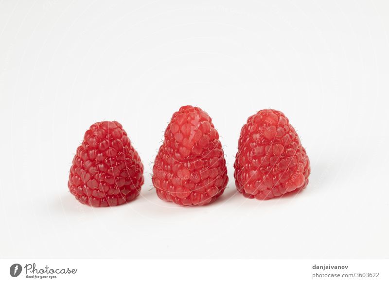 Raspberry fruits on a white background raspberry food red raspberries isolated fresh ripe healthy sweet juicy dessert diet delicious freshness closeup summer