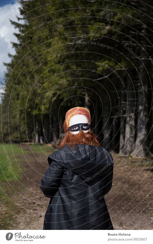 View back: Woman with face mask on the back of her head inverted world upside down Face Face mask Looking back all in view False Head Back of the head