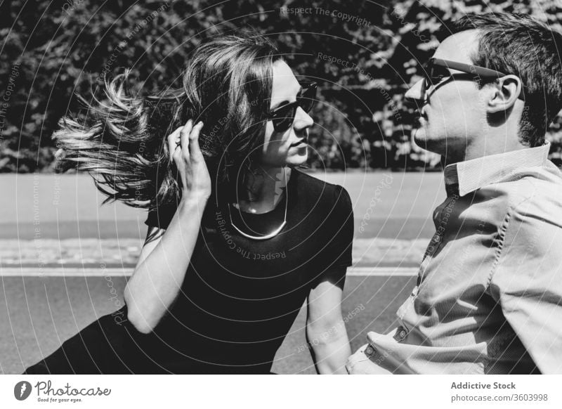 Stylish couple together on roadway style elegant city love relationship enjoy romantic london england united kingdom roadside affection sit handsome happy