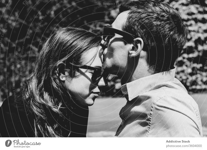 Stylish couple together on roadway kiss style elegant city love relationship enjoy romantic london england united kingdom roadside affection sit handsome happy