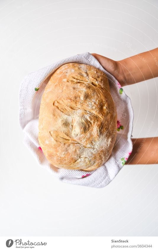 Woman's hands holding freshly homemade baked bread, top view cuisine cooking baking eat female healthy towel background food brown baker flat lay bakery organic