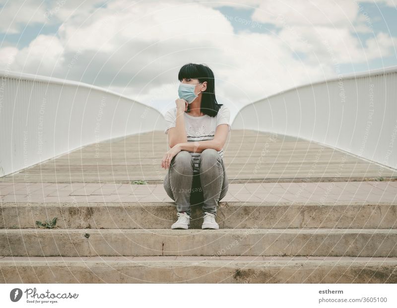 thoughtful woman wearing medical mask covid-19 virus epidemic pandemic quarantine disappointed disease people female sad pensive outdoor prevention sadness