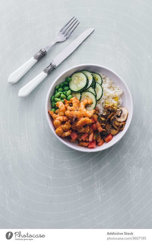 Poke bowl with shrimp and fresh vegetables poke raw cuisine dinner exotic tradition hawaiian nutrition healthy gourmet tasty culinary mushroom cucumber bean