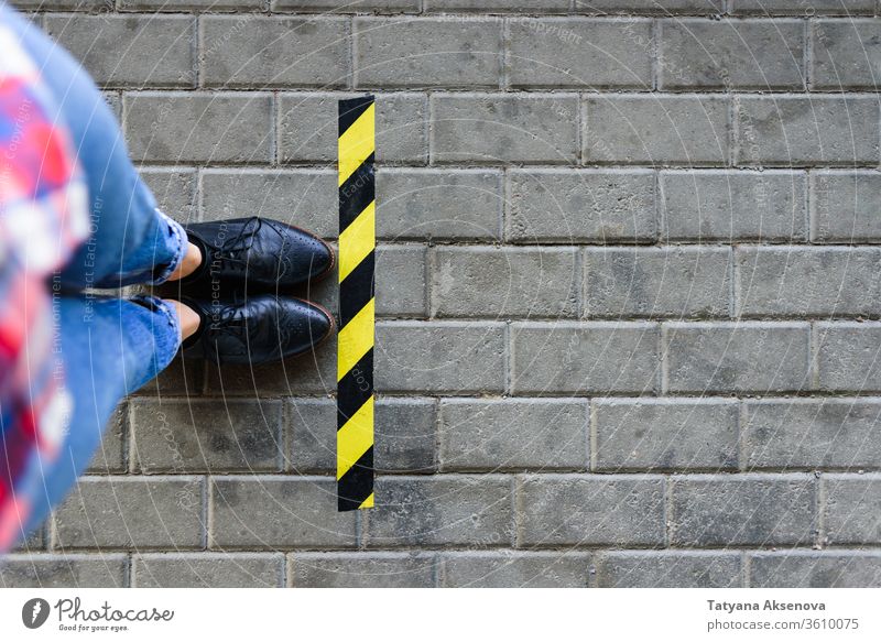 Standing near the border queue on the road social distancing new normal Wait Border distance Queue Line Legs Workshop Street Quarantine pandemic Woman Selfie