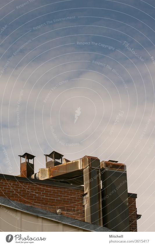 Industrial Vents vent industrial ventilation rust rusty rusting dwelling home apartment city town sky blue minimalist minimalism clouds