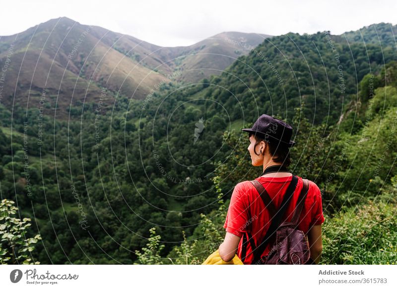 Calm female traveler enjoying natural landscape mountain woman tourist admire calm valley countryside amazing asturias spain freedom adventure rest relax scenic