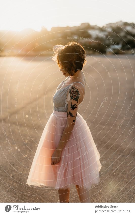 Happy woman dancing on street dancer happy delight artist elegant grace cheerful young sunset female summer smile joy optimist laugh excited move glad positive