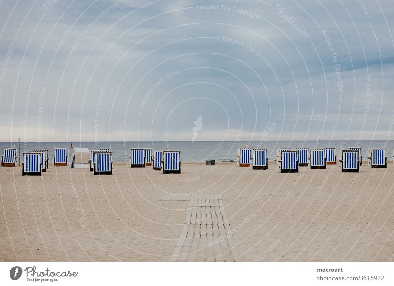 beach chairs Beach Sandy beach Lake Baltic Sea vacation Closed Relaxation Blue Wide angle Clouds Summer cloudy Weather summer maritime tranquillity Wellness