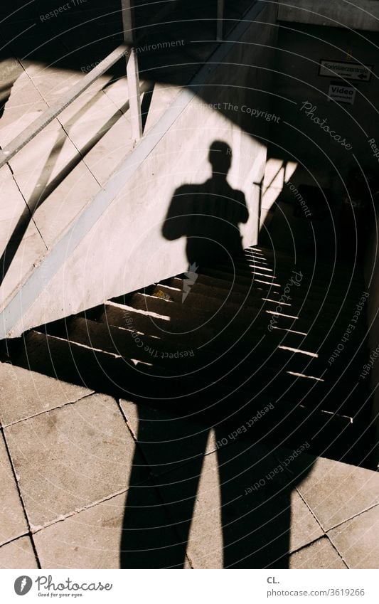 the shadow of the photographer Shadow Shadow play person Man Stairs Architecture Structures and shapes Human being Downward Ground