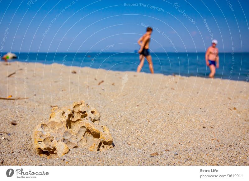 A hollow stone on a sandy shore Abstract Aged Backdrop Beach Blue Coast Coastline Colorful Cracked Golden Gravel Ground Hole Holiday Hollow Horizon Idyllic