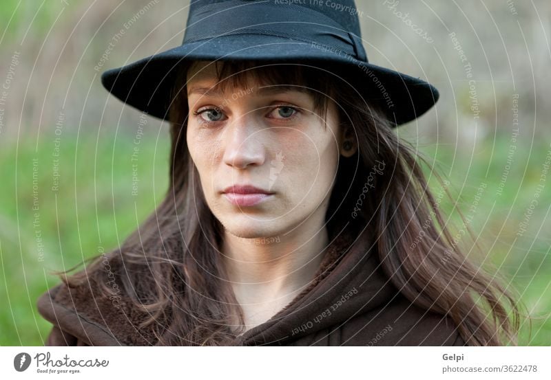 Sad woman with black hat beautiful sad person portrait young lifestyle girl female pretty beauty attractive people fall caucasian autumn model lady face outdoor