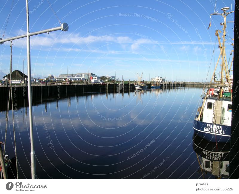 Port of dreams I Ocean Jetty Still Life Clouds Reflection Water Harbour Nature Bensersiel