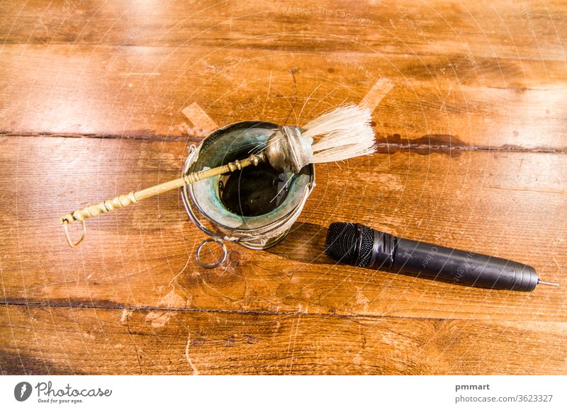 blessed water and microphone ready to start mass and to welcome the faithful, believers and the whole world communicate speaker francesco pyx contain wine hosts