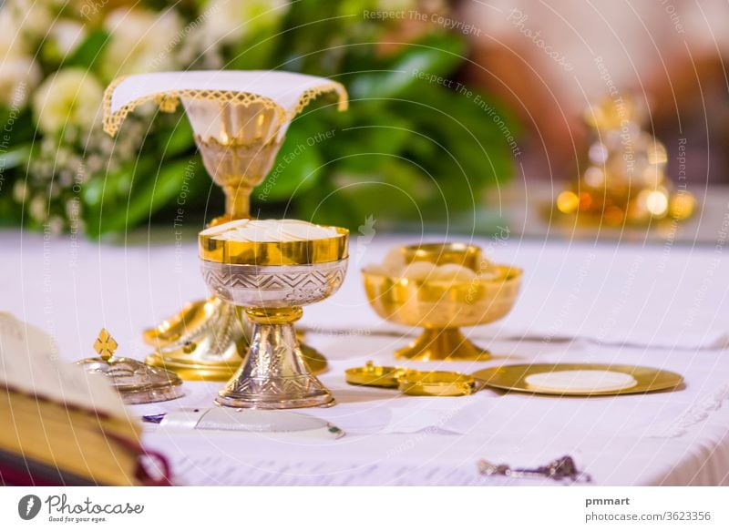 altar with host and chalice with wine in the churches of the pope of rome, francesco cup cross christianity gold sacred mass pyx goblet contain hosts blood body