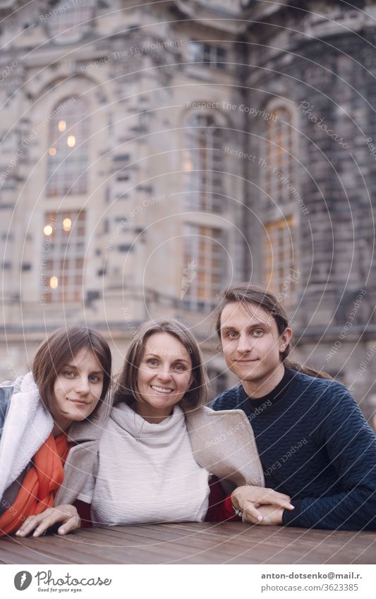 Mother daughter and son child family love happy joy fun outdoors kids teenager ancient castle wall together tender gentle sweet cute nice positive kind lovely smile