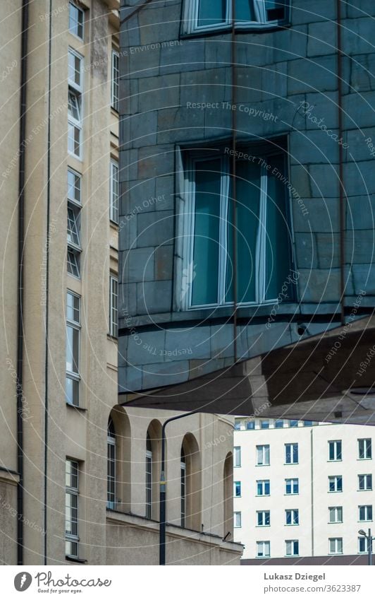 Abstract View of a three downtown buildings close-up no people metropolis outdoor reflection mirror glasses technology windows travel city urban blue structure