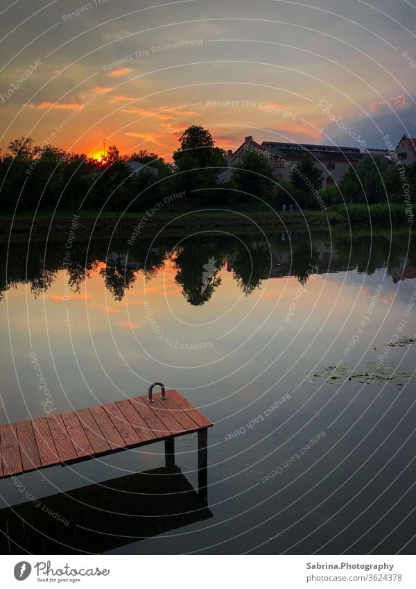 Summer sunset on the banks of the river Saale in Halle, Saxony-Anhalt Halle (Saale) Germany River River bank Footbridge Sunset Sunbeam Sky Colour photo Deserted