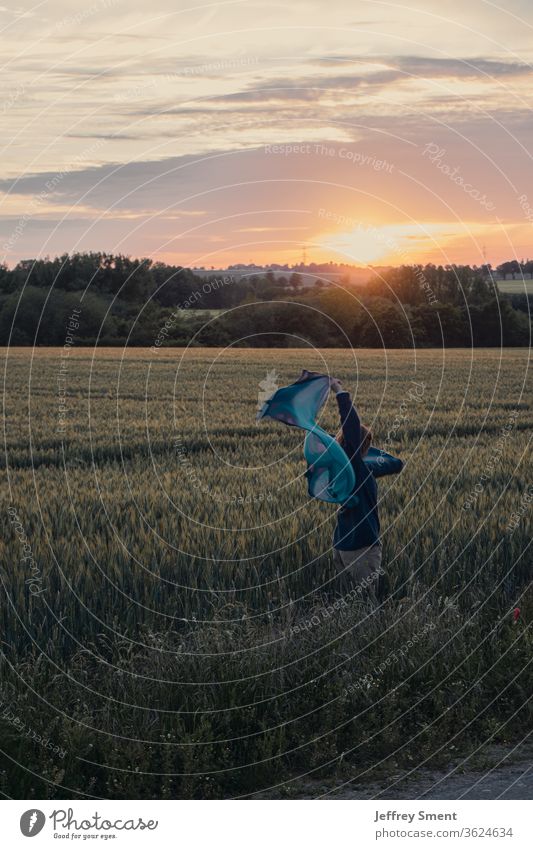 Playing and dancing in the wheat field Dance Movement Sunset Rag Joy Esthetic Exterior shot Joie de vivre (Vitality) Feminine Life Adults Inspiration Woman