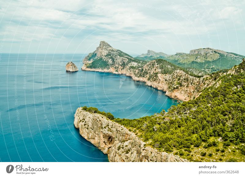 Cap Formentor Tourism Far-off places Freedom Summer Ocean Island Mountain Rock Nature Landscape Elements Sky Clouds Storm clouds Peak Coast Lakeside Bay