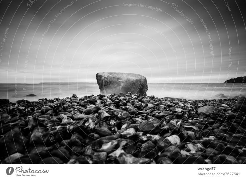 Stones on the beach of the Baltic Sea I Baltic beach stones Boulders Wet Cold Glittering flints chicken gods Ocean Beach coast Nature Water Waves Landscape Sky