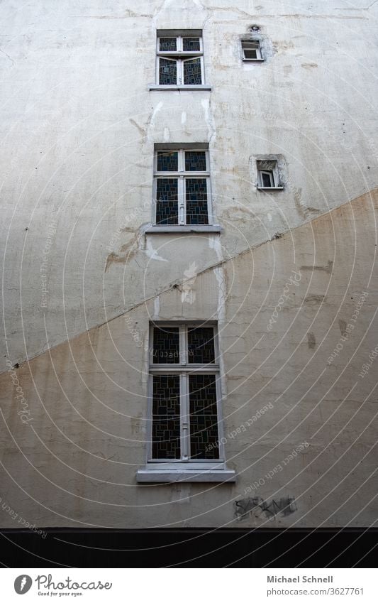 Old, grey house wall with five windows Gray Wall (building) Facade House (Residential Structure) Colour photo Architecture Gloomy Subdued colour