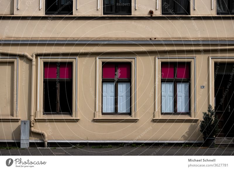 Beige house facade with large windows Window House (Residential Structure) Architecture Facade built Deserted Exterior shot Manmade structures Old