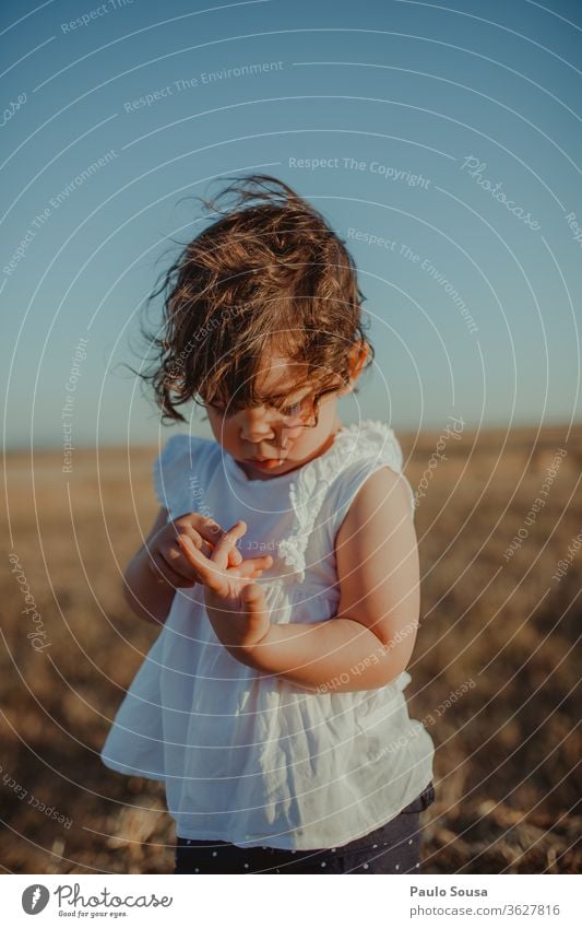 Child in the fields childhood Summer Summer vacation Sunlight Vacation & Travel Playing Multicoloured Human being Leisure and hobbies Nature Day