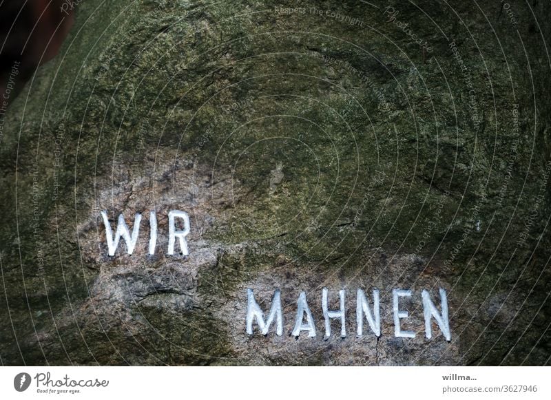 Boulder with the inscription "We remind" memorial foundling Rock Characters Text Letters (alphabet) dunning war victim Inscription Nazi period admonish