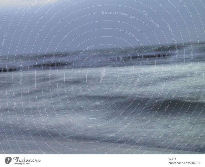 The Baltic Sea at Hidensee Ocean Surf Beach blurred due to long exposure time pale light Evening