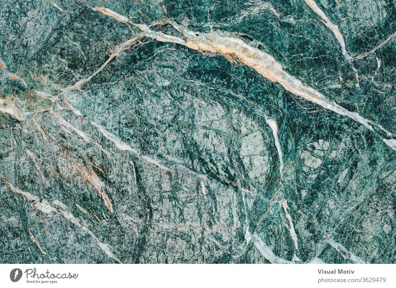 Texture of an Alpine greenish marble slab with white veins texture alpine surface stone calcareous background rough aesthetic material mineral abstract natural