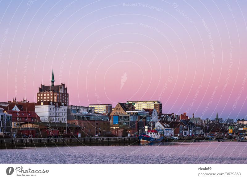 The city harbour in Rostock in the morning Town River ship Mecklenburg-Western Pomerania Warnov Harbour Architecture houses built boat Landmark