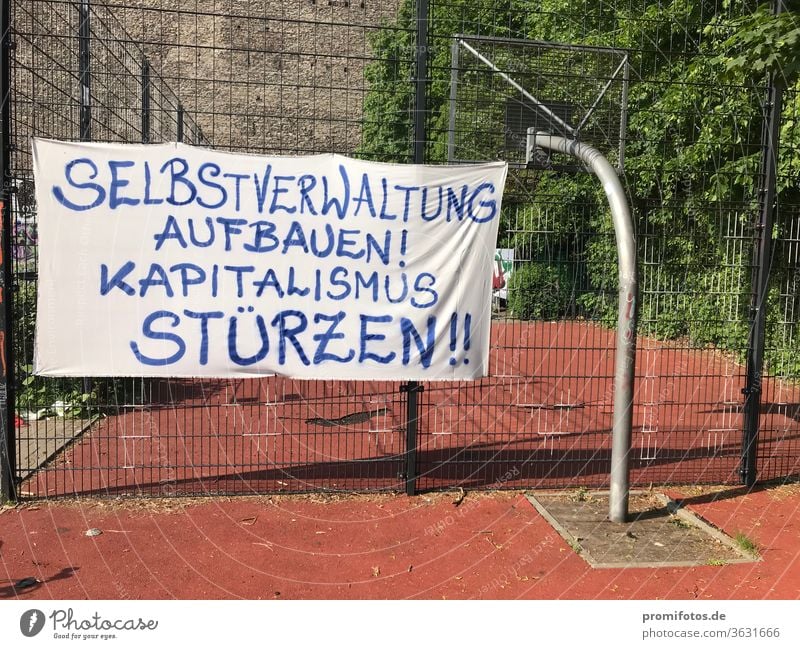 Scarf: "Establish self-administration! Overthrow capitalism!". Seen in Berlin. protest Capitalism policy Economy Company Germany neoliberalism privatization