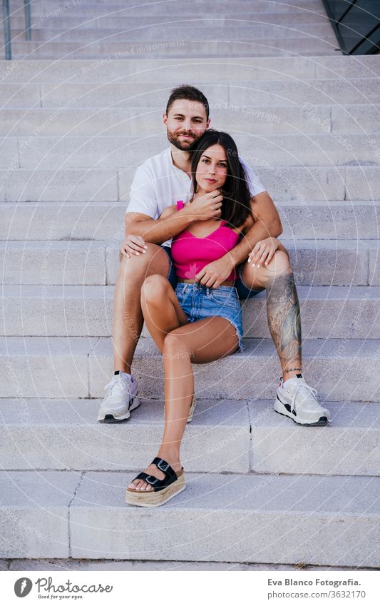 happy young couple outdoors. Family and love concept city lifestyle together togetherness tattoo caucasian female 2 woman romance summer girl smiling travel