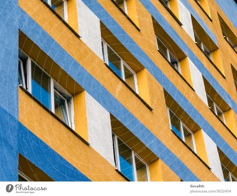 modern house with yellow and blue walls and empty windows Ukraine Apartment Apartments Architecture background Blue bottom view built City colourful