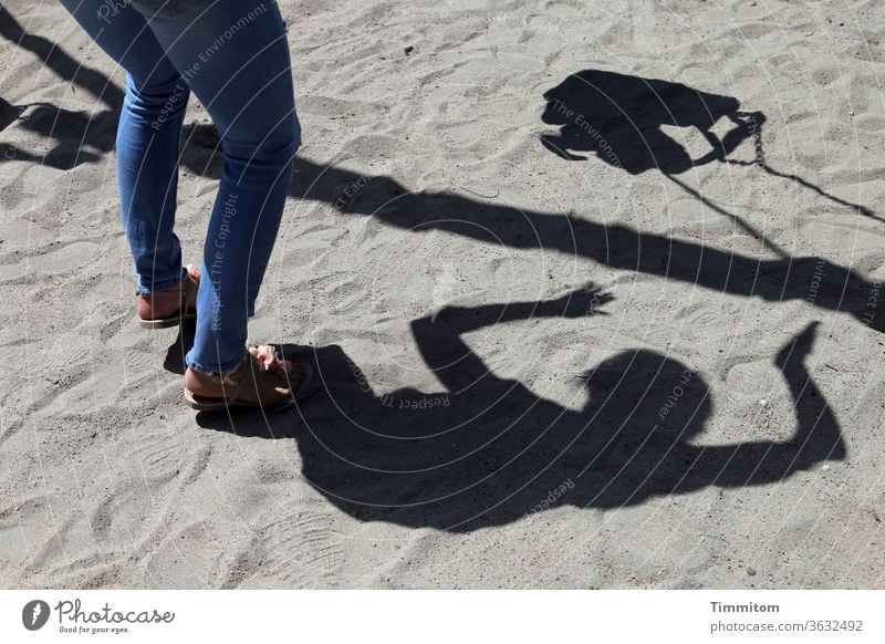 Dynamic | Mother and child full of joy Shadow Swing To swing Child Playground Sand Playing Infancy Joy Joie de vivre (Vitality) Exterior shot