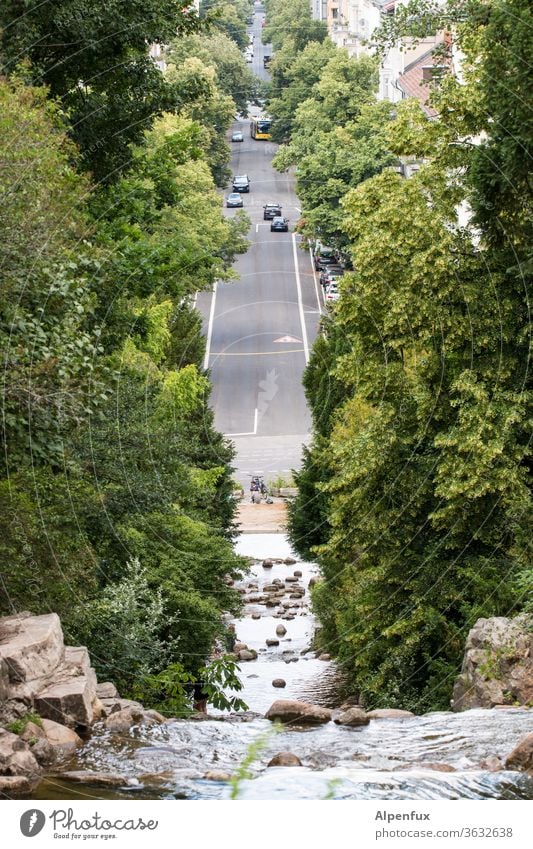 Symmetry | Asphalt Waterfall River Brook Exterior shot Street Road traffic Environment Wet Flow Nature Day Landscape natural Colour photo Stone Elements Rock