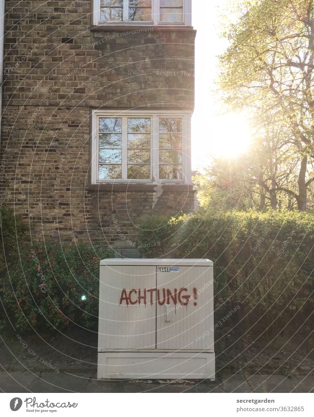 Trip hazard. esteem power box Architecture built Settlement Hedge stream Danger of Life Window Building corner Corner Facade Exterior shot Deserted Colour photo