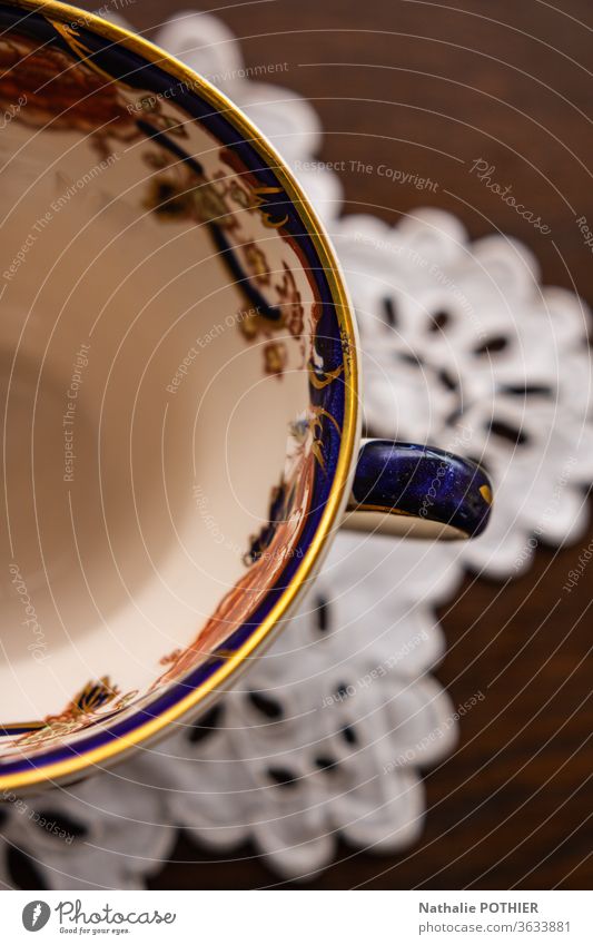 Empty cup of tea Tea cup Colour photo Interior shot Close-up doily table wood doily... 19th century Teatime Table