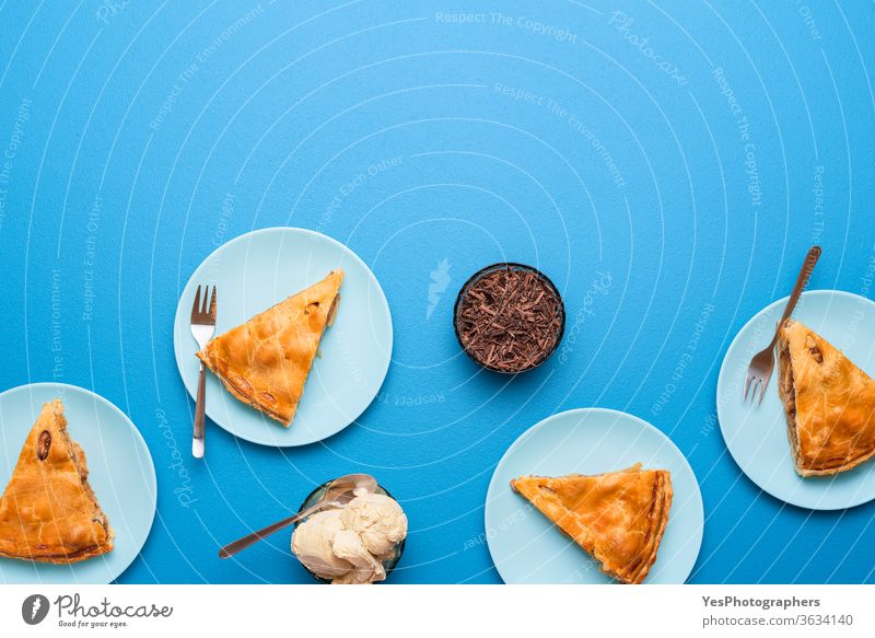 Apple pie slices on plates. Thanksgiving day dinner table. Apple dessert 4 july above view american apple pie autumn bakery blue background breakfast cake