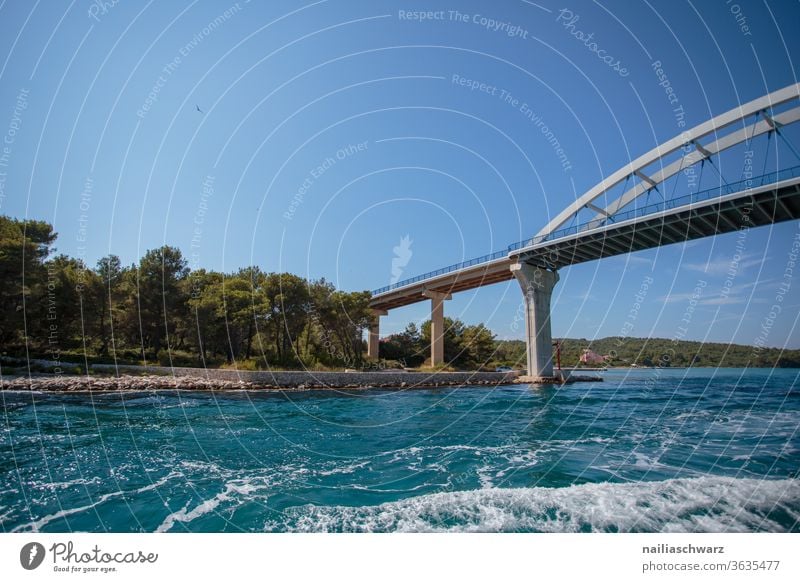 Zdrelac Bridge bridge Pasman Croatia Ocean Water seascape Island Waves Summer Summer vacation voyage Trees on the horizon Landscape Blue Sky Peaceful relaxed