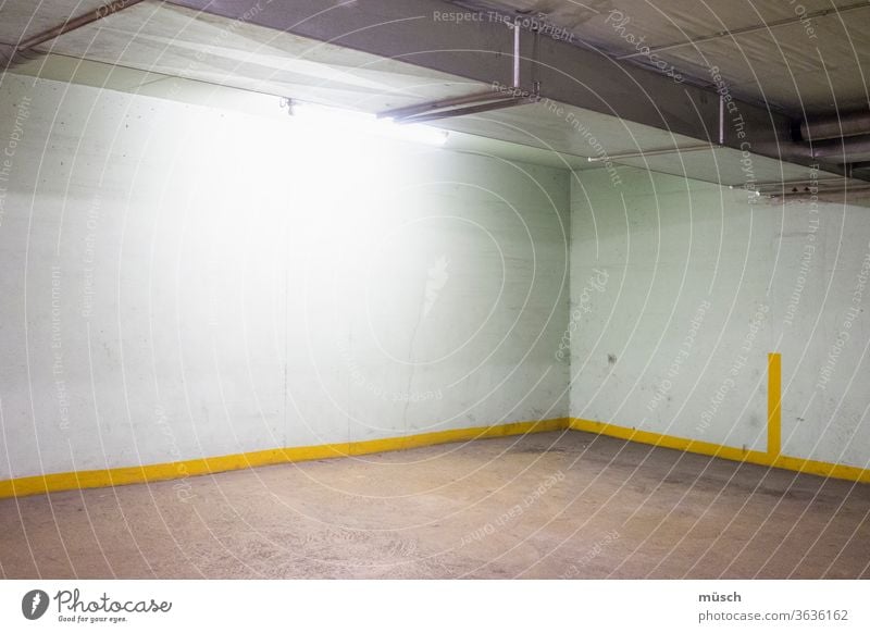 Empty parking garage / empty parking space Eerie Yellow women White Wall (building) distress Fear Corner Stripe Metal Light Lamp void arrogance insecurity