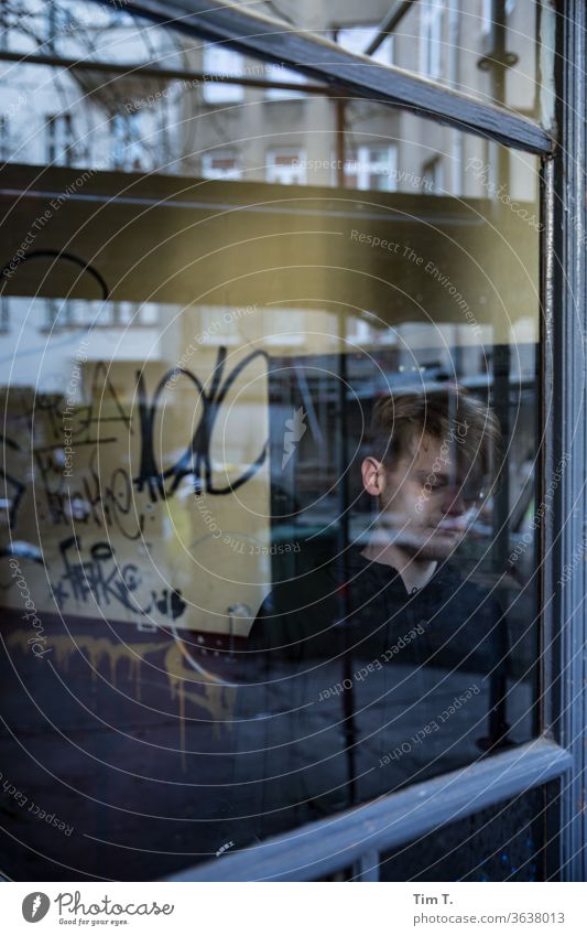 a man stands behind a glass pane in the staircase Berlin Prenzlauer Berg Town Exterior shot Capital city Old building House (Residential Structure) Downtown