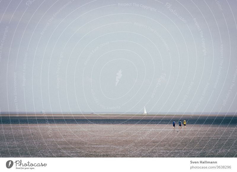 three people and a boat ocean nature beach coast landscape blue sea sand seaside sunlight tourism travel desert endless sea life loneliness road trip wave