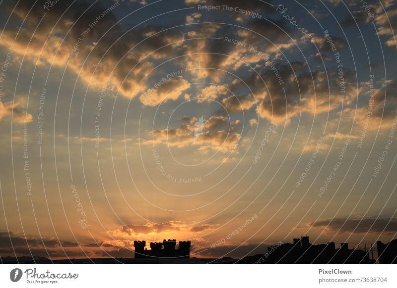 Sunset over a castle Clouds Sky Red Dusk Horizon Orange Architecture