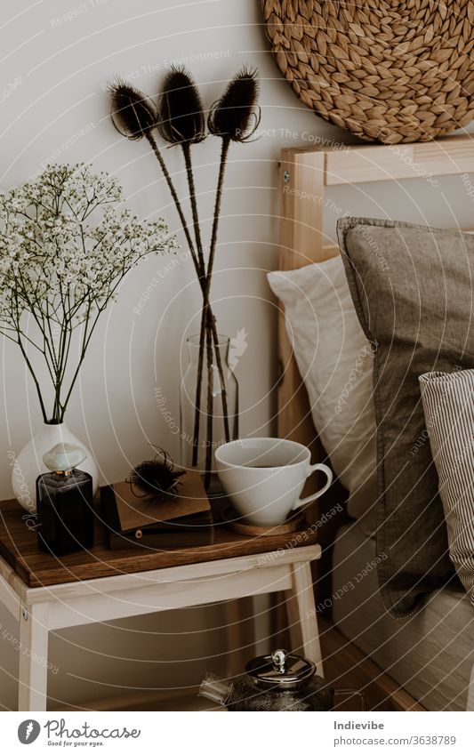 Bedroom detail with wooden stool, ceramic mug and dried flowers Stool Dried flower Flower White Natural Dream Idea Morning feeling Vase scandinavian Style