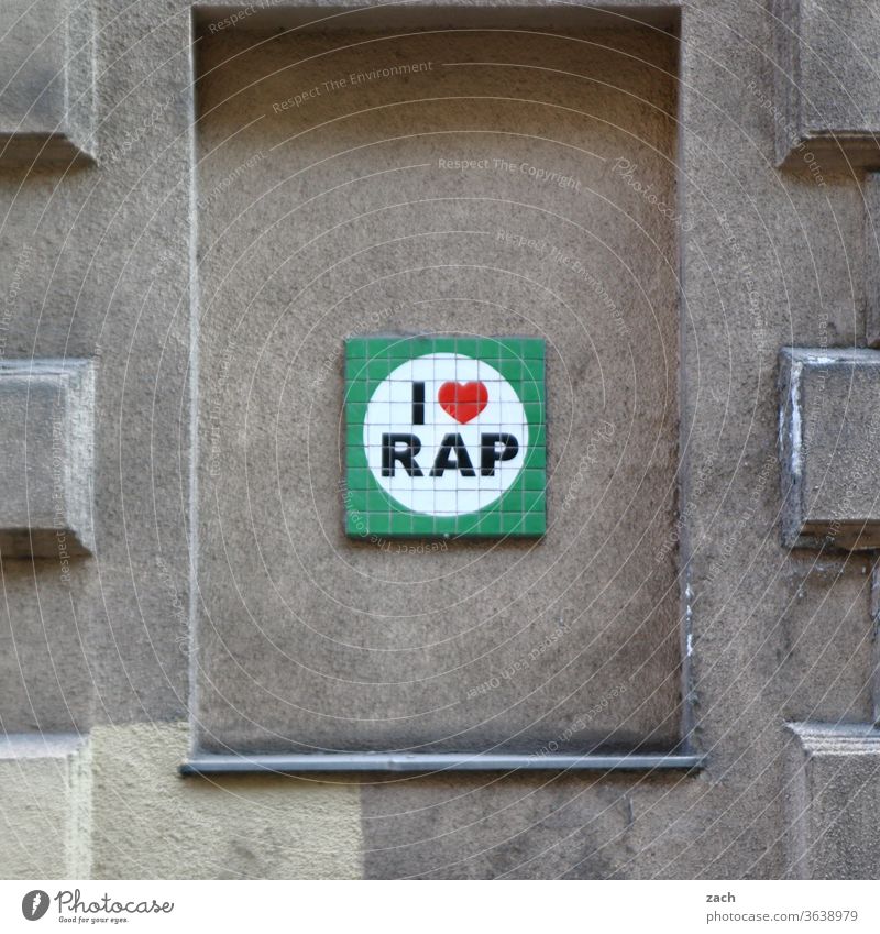 I'm not Rapper Music Hip-hop Recitative Letters (alphabet) Characters Mosaic Facade Wall (building) Graffiti Cool (slang) Lifestyle Gray Rap music Youth culture